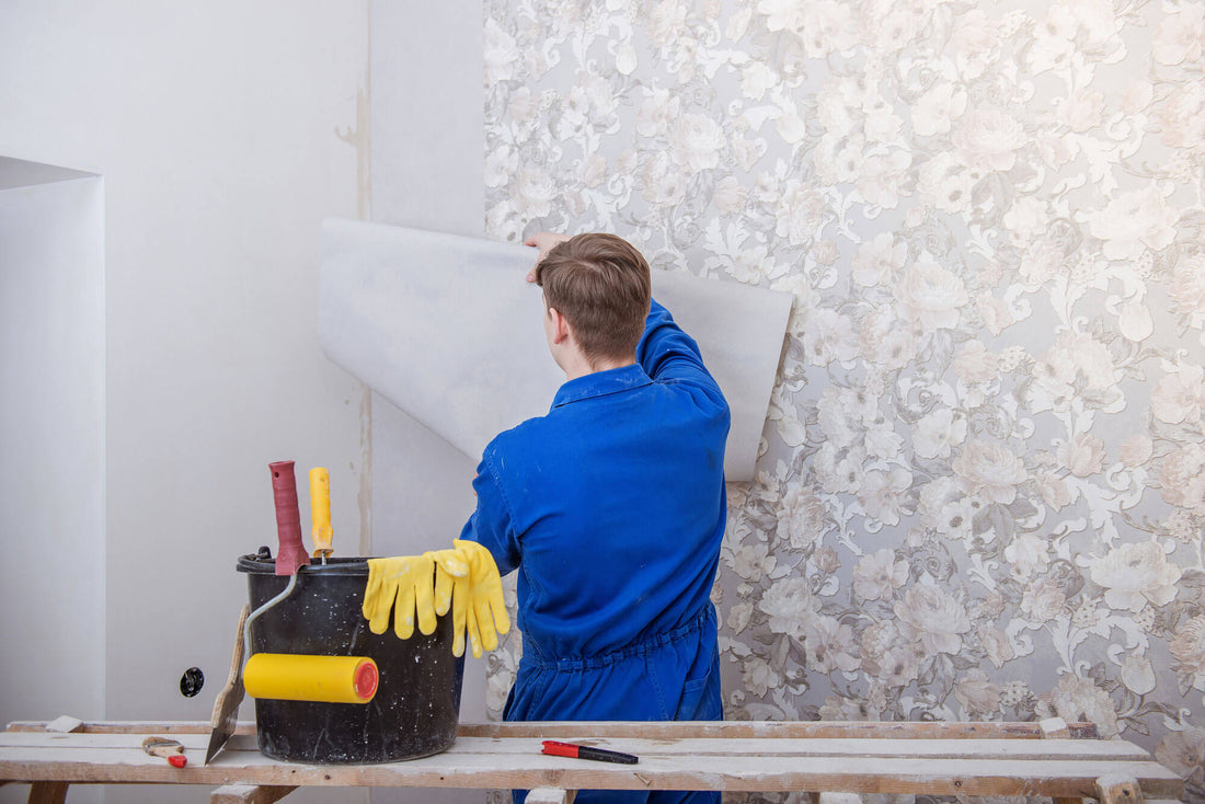 Expert wallpaper installation in progress